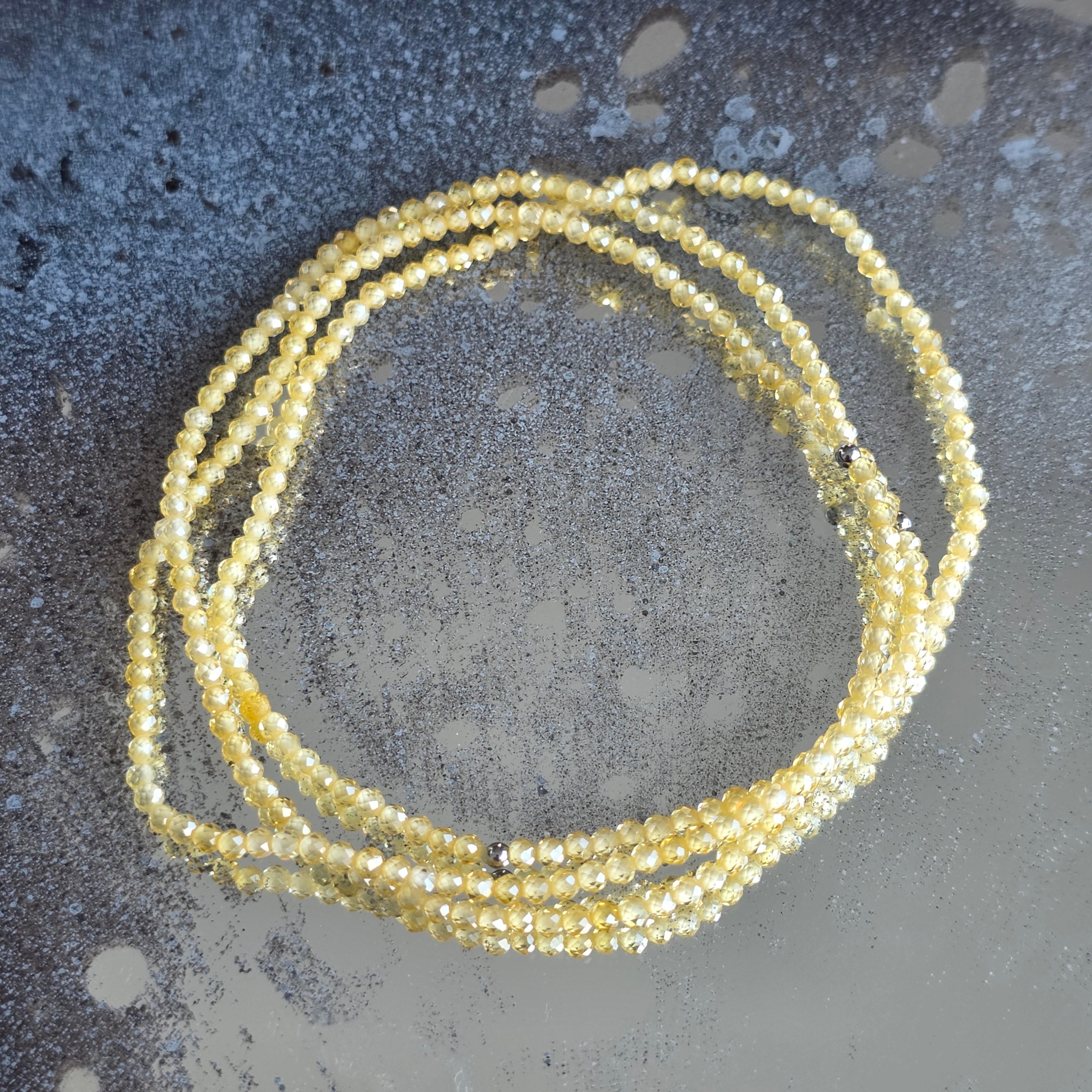 Bratara fatetata zircon galben 2 mm