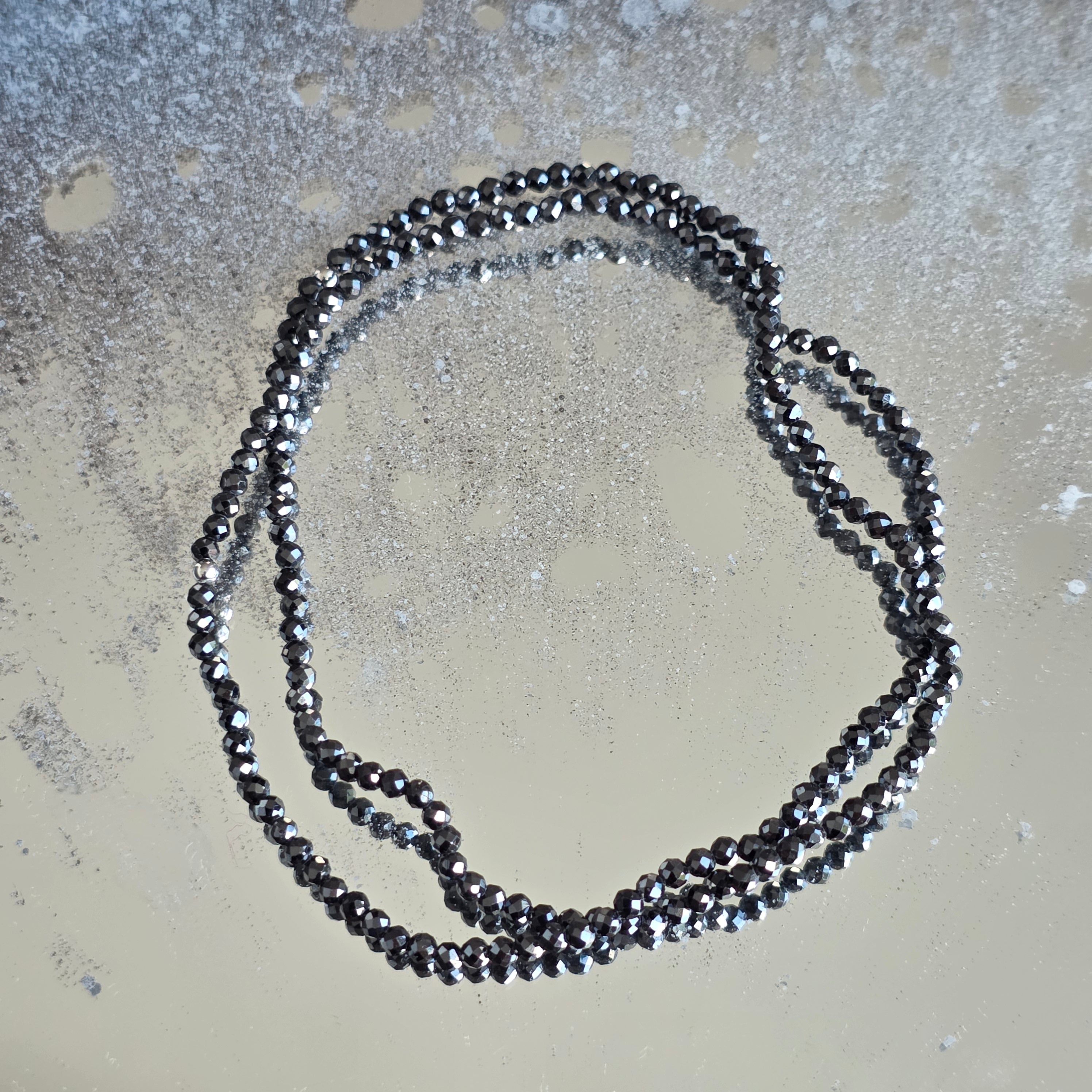Bratara fatetata zircon negru 2 mm