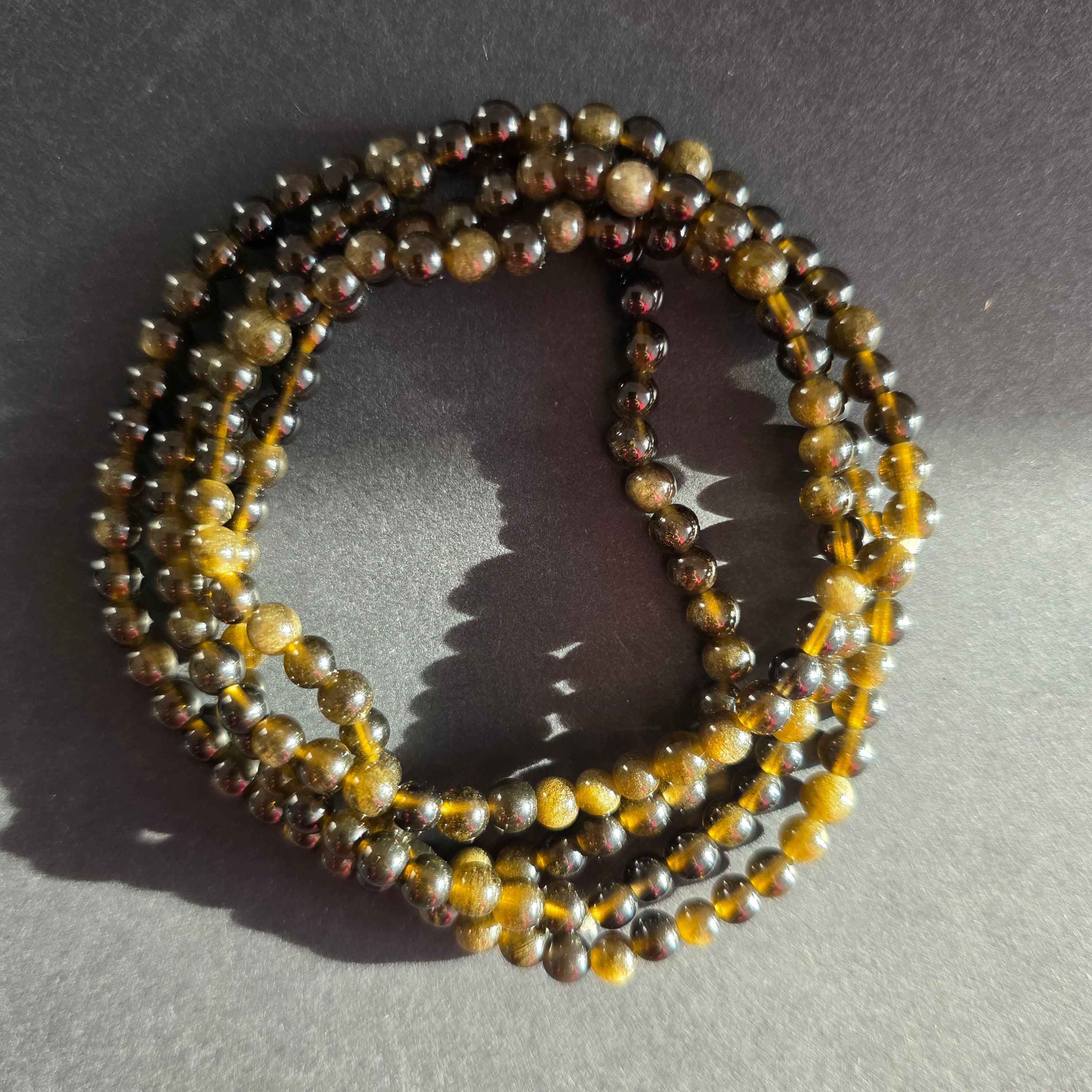 Bratara obsidian auriu 4-5 mm