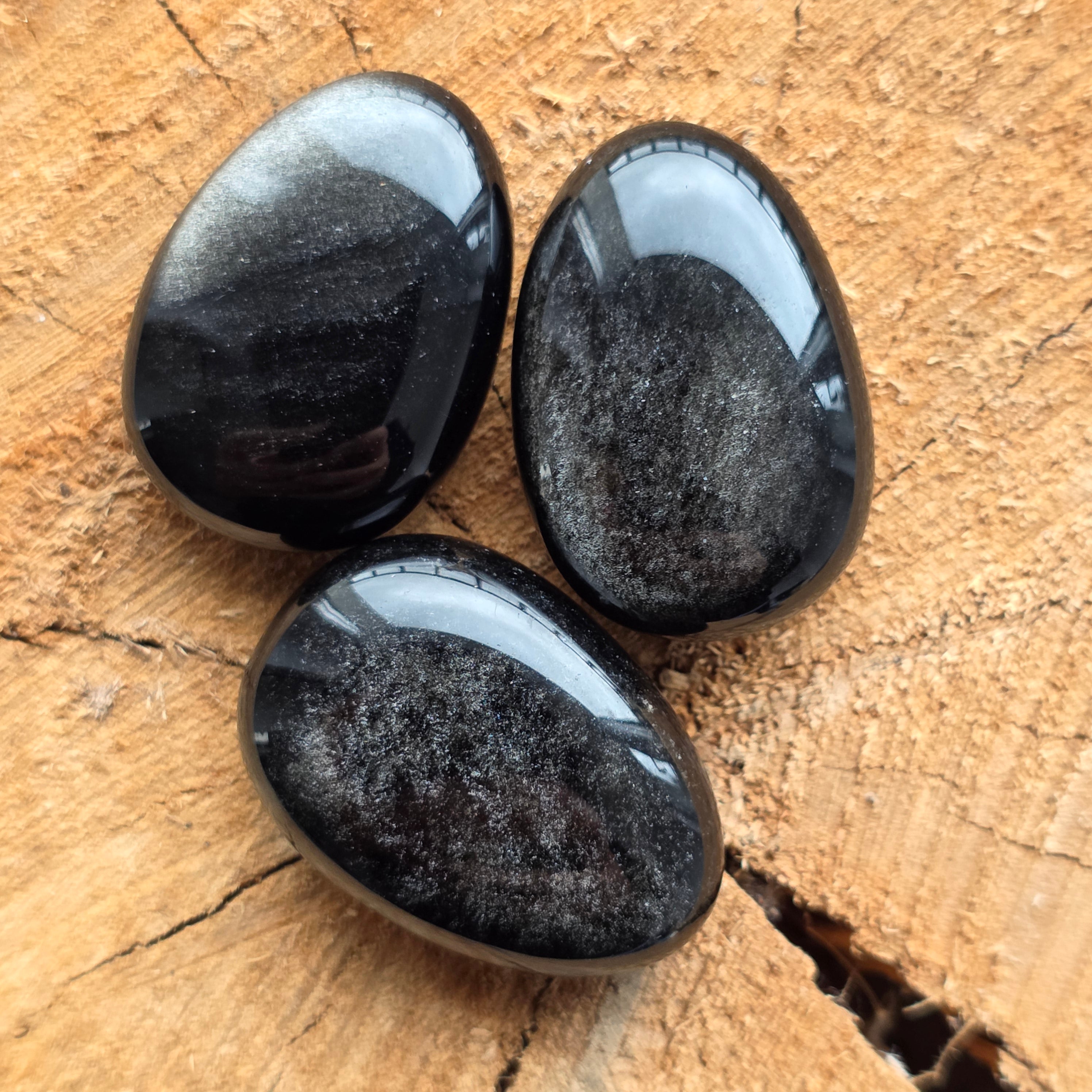 Cabochon obsidian argintiu rulat